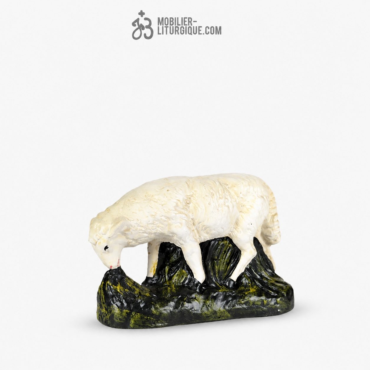 Animal de la cr&egrave;che : Mouton broutant, en pl&acirc;tre color&eacute;