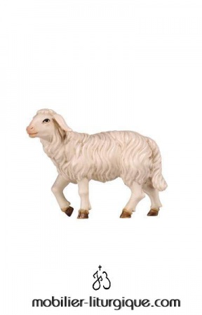 animal de la crèche mouton blanc debout regard vers gauche
