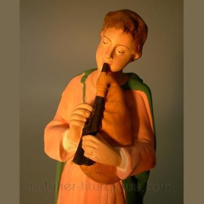 Homme jouant de la flute