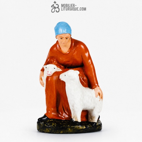 Personnage de cr�che : Berg�re tenant deux moutons, en pl�tre color�