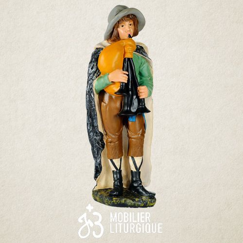 Personnage de cr�che : Jeune berger jouant de la cornemuse, en pl�tre color� Polychrome